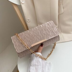 Clutch drapeado eslabones