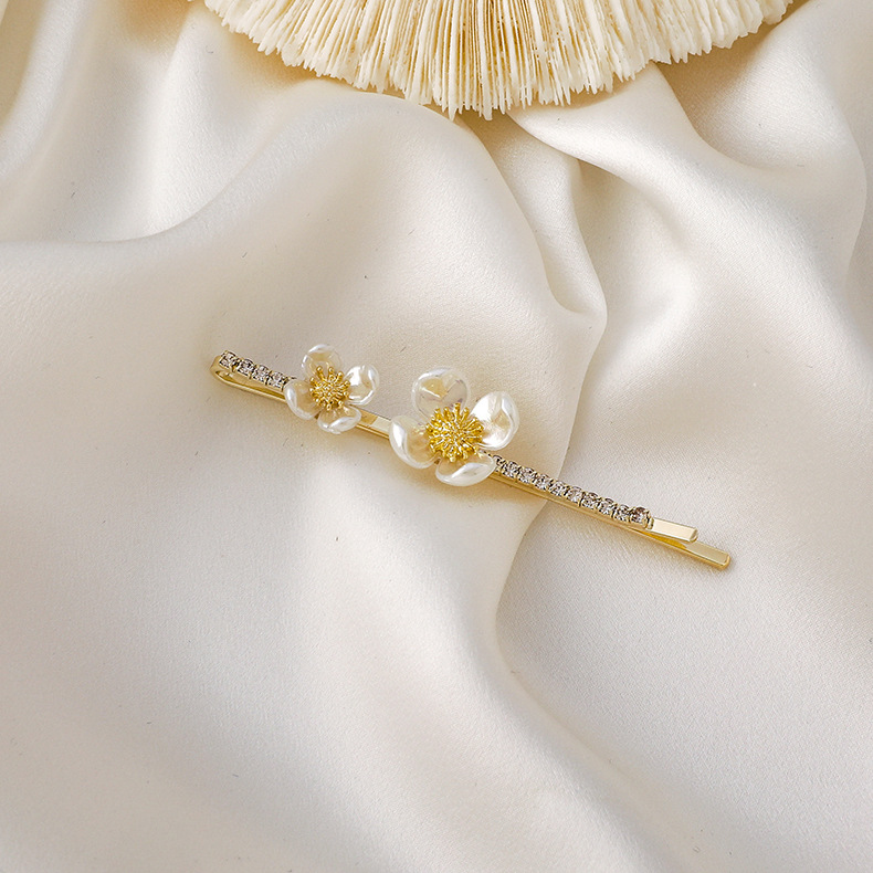 HAIR CLIP FLORES