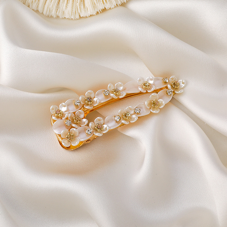HAIR CLIP FLORES